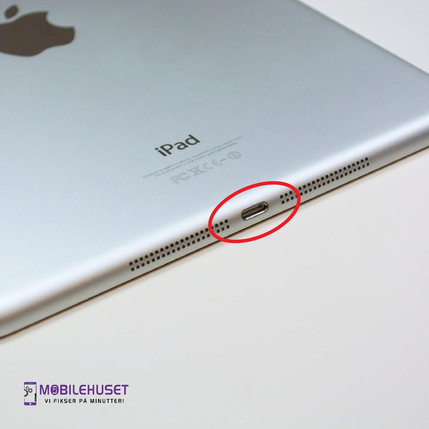 iPad Air 9.7-inch (2nd Gen 2014) Ladingport Reparasjon